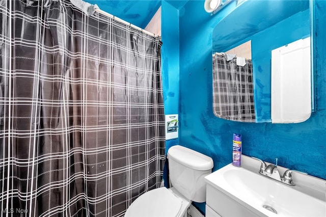 3741 E 146th St, Cleveland, OH 44120 - bathroom with toilet, a shower with curtain, and vanity