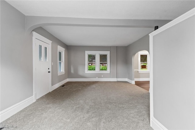453 Saint Leger Ave, Akron, OH 44305 - spare room with arched walkways, carpet, and baseboards