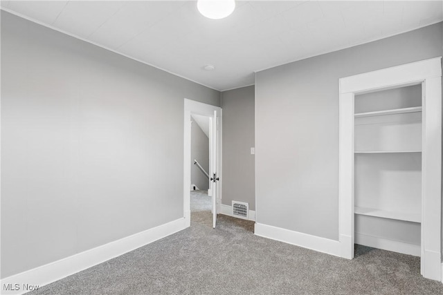 453 Saint Leger Ave, Akron, OH 44305 - unfurnished bedroom with carpet, baseboards, and a closet