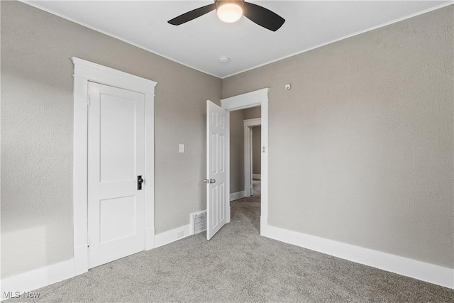 453 Saint Leger Ave, Akron, OH 44305 - unfurnished bedroom featuring carpet flooring and ceiling fan