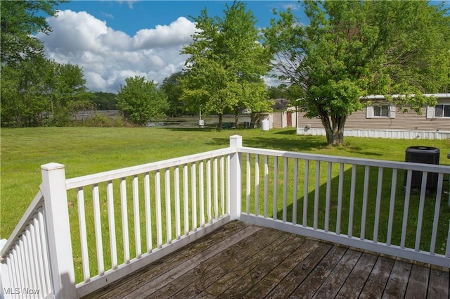 4691 Scenic Dr, Ravenna, OH 44266 - deck with a yard, cooling unit, and an outdoor structure