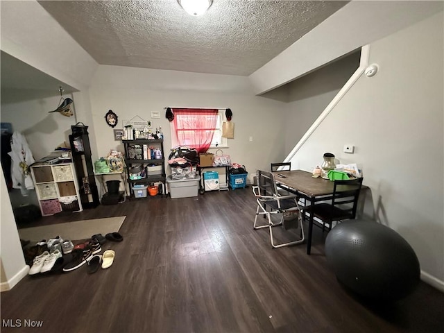 845 S Liberty Ave, Alliance, OH 44601 - miscellaneous room featuring wood finished floors and a textured ceiling