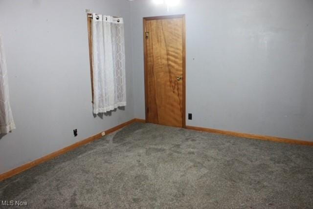 55960 National Rd, Bridgeport, OH 43912 - empty room featuring carpet flooring and baseboards