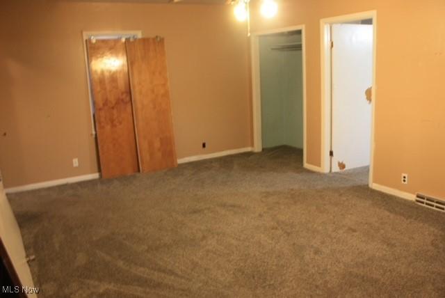 55960 National Rd, Bridgeport, OH 43912 - spare room with carpet flooring and baseboards