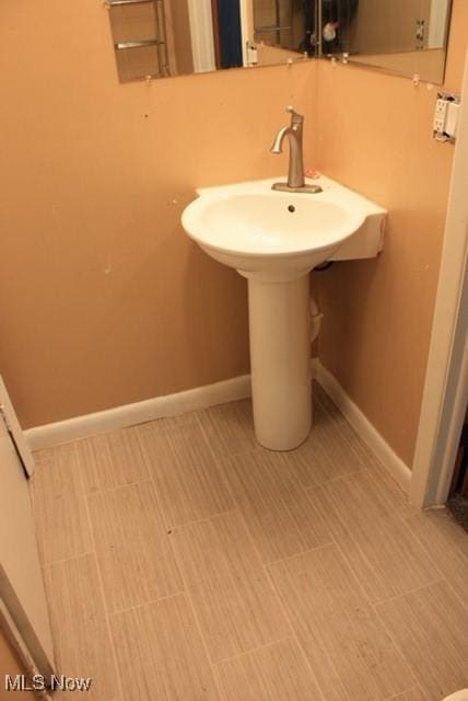 55960 National Rd, Bridgeport, OH 43912 - bathroom with baseboards