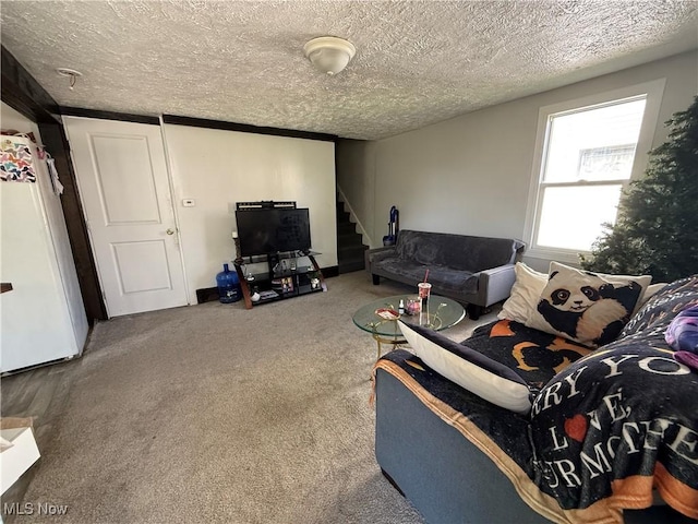 405 E Oxford St, Alliance, OH 44601 - living room with stairs, a textured ceiling, and carpet floors