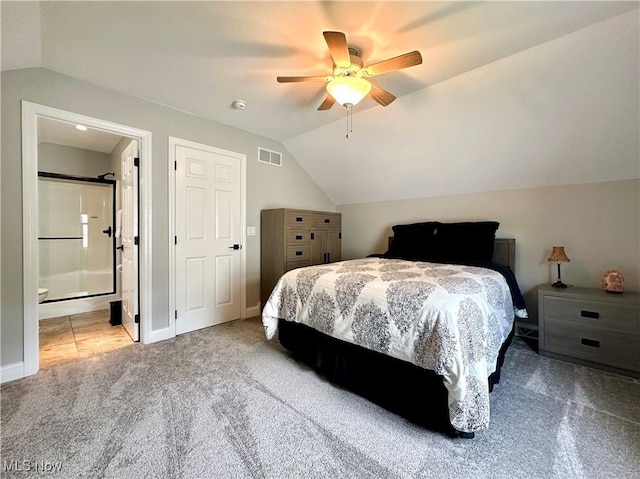 6836 Twin Oaks Ct, Canfield, OH 44406 - bedroom featuring carpet flooring, vaulted ceiling, ceiling fan, baseboards, and ensuite bathroom