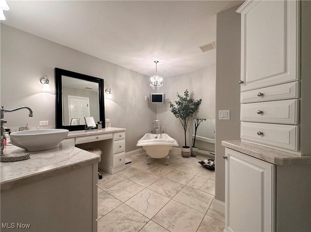 6836 Twin Oaks Ct, Canfield, OH 44406 - bathroom featuring vanity, a chandelier, baseboards, and marble finish floors
