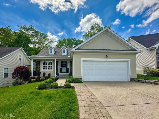 6836 Twin Oaks Ct, Canfield, OH 44406 - view of front of house featuring stucco siding, stone siding, an attached garage, a front lawn, and concrete driveway