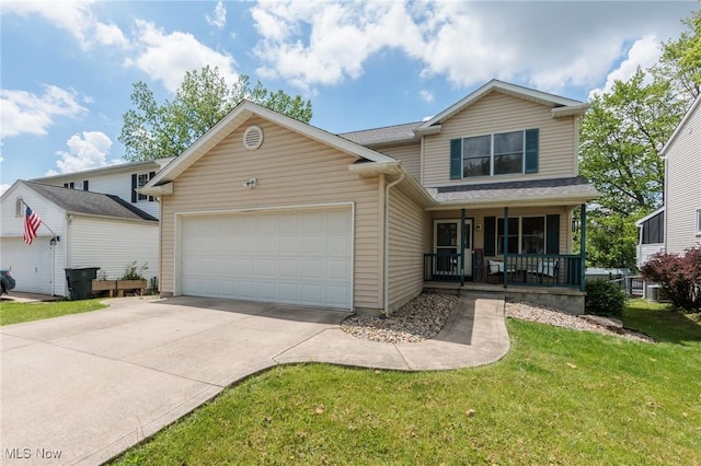 354 Ivanhoe Ave, Wadsworth, OH 44281 - traditional-style house featuring a porch, an attached garage, a front lawn, and driveway