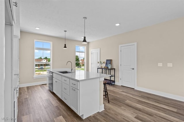 2087 Wynn Rd, Cleveland, OH 44118 - kitchen featuring a sink, stainless steel dishwasher, dark wood-style floors, baseboards, and recessed lighting