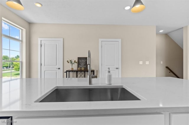2087 Wynn Rd, Cleveland, OH 44118 - kitchen with a sink, recessed lighting, and white cabinetry