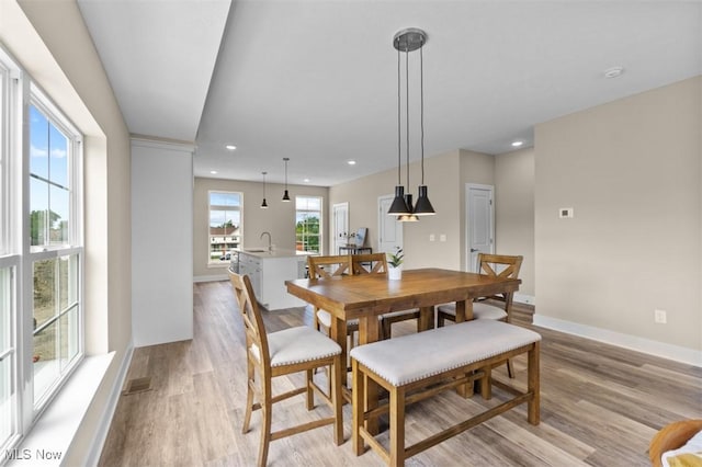 2087 Wynn Rd, Cleveland, OH 44118 - dining area featuring light wood-type flooring, baseboards, and recessed lighting