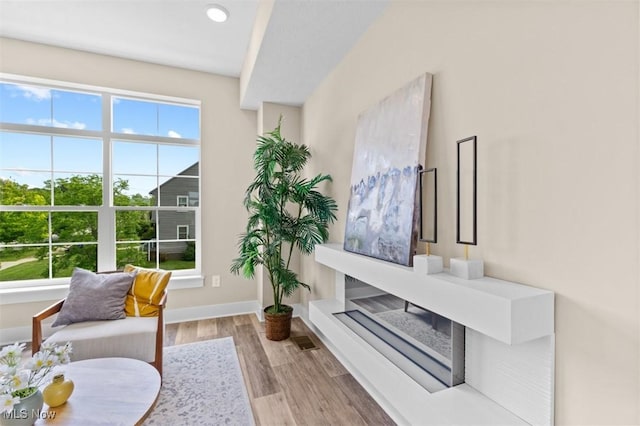 2087 Wynn Rd, Cleveland, OH 44118 - living area featuring wood finished floors, baseboards, and recessed lighting