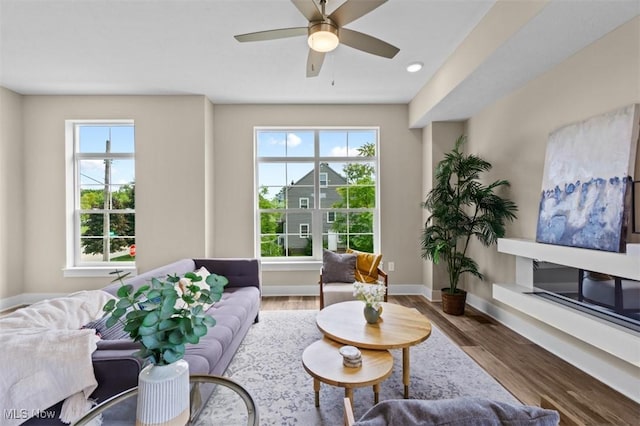 2087 Wynn Rd, Cleveland, OH 44118 - living room with wood finished floors, baseboards, a ceiling fan, and recessed lighting