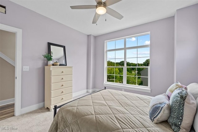 2087 Wynn Rd, Cleveland, OH 44118 - bedroom with baseboards, carpet floors, and ceiling fan