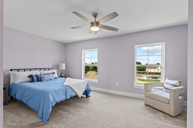 2087 Wynn Rd, Cleveland, OH 44118 - carpeted bedroom featuring baseboards and ceiling fan