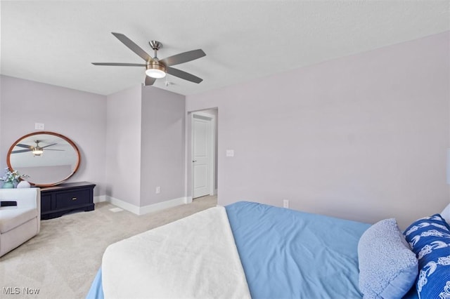 2087 Wynn Rd, Cleveland, OH 44118 - bedroom featuring light carpet, baseboards, and a ceiling fan