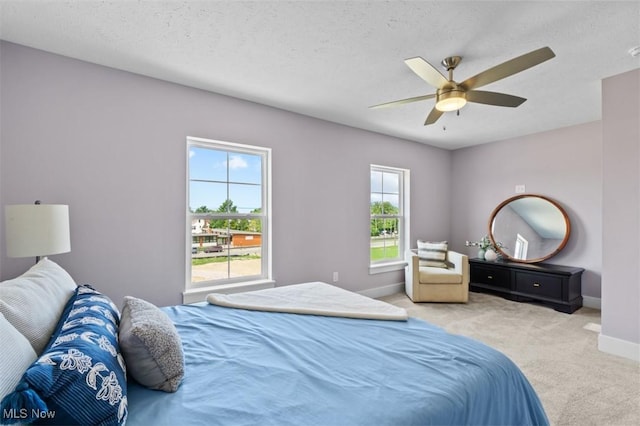 2087 Wynn Rd, Cleveland, OH 44118 - bedroom featuring carpet, baseboards, ceiling fan, and a textured ceiling