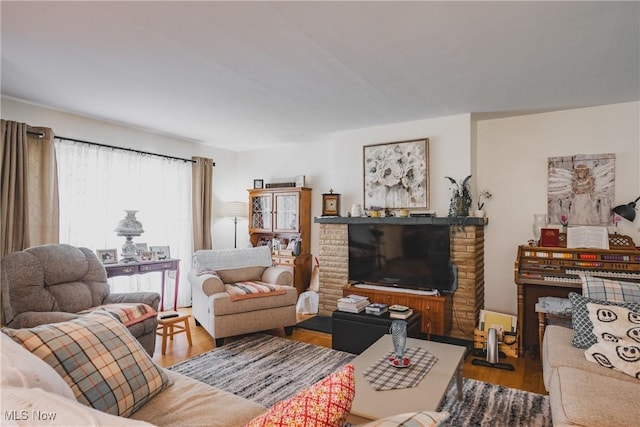1608 Lawrence St, Parkersburg, WV 26101 - living area with wood finished floors and a fireplace