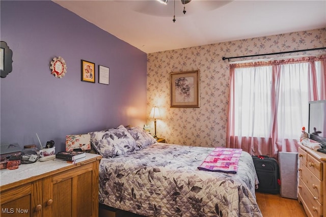 1608 Lawrence St, Parkersburg, WV 26101 - bedroom featuring light wood-style flooring, wallpapered walls, and ceiling fan