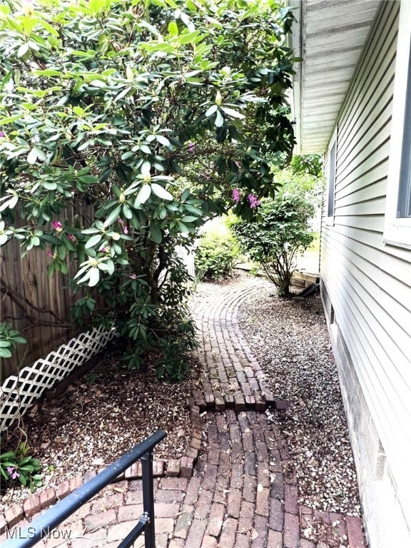 1585 Hilda St, Lakemore, OH 44250 - view of yard featuring fence