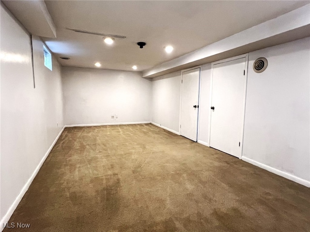 1585 Hilda St, Lakemore, OH 44250 - finished basement featuring carpet flooring, baseboards, and recessed lighting