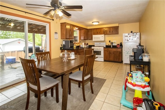 6333 Warren Sharon Rd, Oh, OH 44403 - dining space featuring light tile patterned floors and ceiling fan