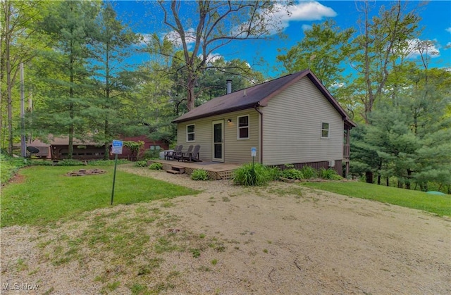 7324 Ferngreen Rd, Carrollton, OH 44615 - view of home's exterior featuring a lawn and a wooden deck