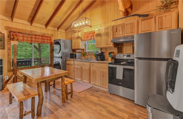 7324 Ferngreen Rd, Carrollton, OH 44615 - kitchen featuring appliances with stainless steel finishes, under cabinet range hood, beam ceiling, wooden ceiling, and stacked washer / dryer