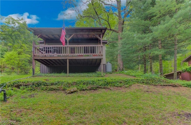 7324 Ferngreen Rd, Carrollton, OH 44615 - rear view of house featuring a deck and board and batten siding
