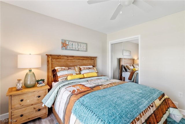 114 W Cherokee Trl, Bayview, OH 44870 - bedroom featuring a closet, ceiling fan, baseboards, and wood finished floors