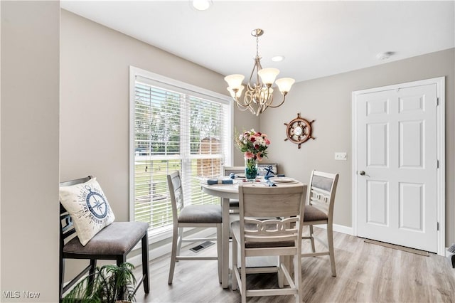 114 W Cherokee Trl, Bayview, OH 44870 - dining area with a chandelier, light wood finished floors, recessed lighting, and baseboards