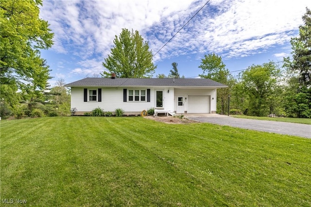 5 Prospect St, North Fairfield, OH 44855 - single story home with a garage, driveway, a front yard, and a chimney