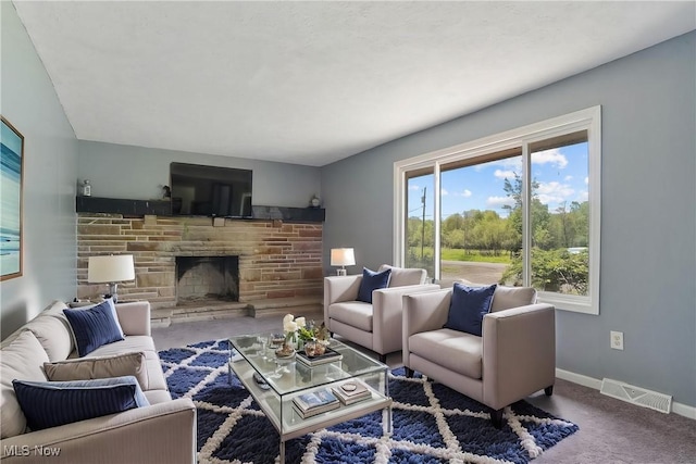10699 Whippoorwill Rd, Newton Falls, OH 44412 - living room featuring a fireplace, baseboards, and carpet flooring