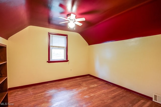 7026 S Boyden, Northfield, OH 44067 - bonus room featuring a ceiling fan, lofted ceiling, wood finished floors, and baseboards
