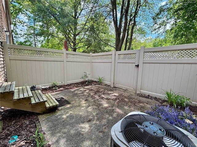 3853 Lake Run Blvd, Stow, OH 44224 - view of patio featuring central AC unit and a fenced backyard