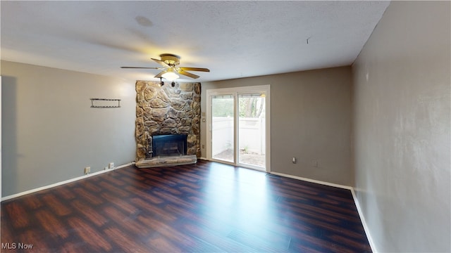 3853 Lake Run Blvd, Stow, OH 44224 - unfurnished living room featuring a ceiling fan, baseboards, wood finished floors, and a fireplace