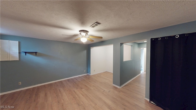 3853 Lake Run Blvd, Stow, OH 44224 - spare room with ceiling fan, wood finished floors, baseboards, and a textured ceiling