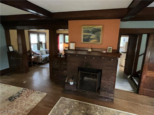 2508 Queenston Rd, Cleveland Heights, OH 44118 - living area featuring wood finished floors, beam ceiling, and a fireplace
