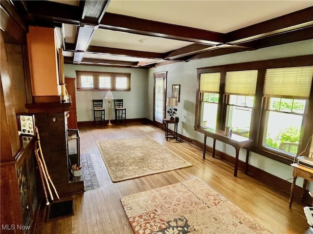 2508 Queenston Rd, Cleveland Heights, OH 44118 - living area featuring baseboards, beam ceiling, light wood-style floors, coffered ceiling, and a baseboard radiator