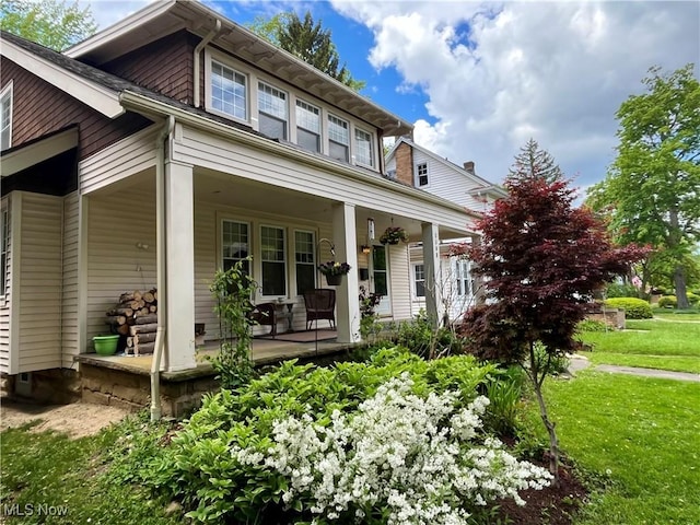 2508 Queenston Rd, Cleveland Heights, OH 44118 - view of front of property with a porch and a front yard