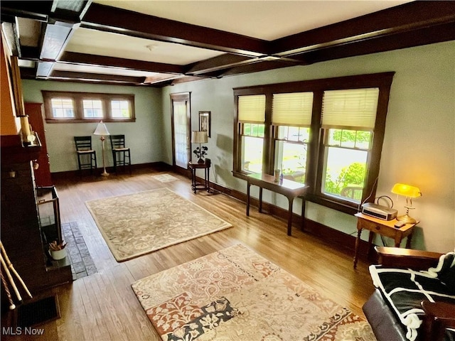 2508 Queenston Rd, Cleveland Heights, OH 44118 - living area featuring baseboards, beamed ceiling, and wood finished floors