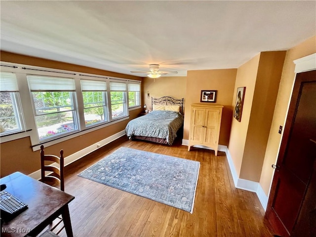 2508 Queenston Rd, Cleveland Heights, OH 44118 - bedroom featuring baseboards, wood finished floors, and a ceiling fan