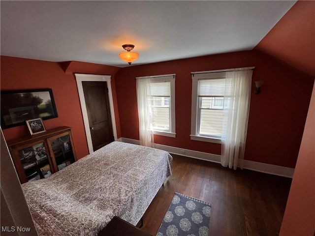 2508 Queenston Rd, Cleveland Heights, OH 44118 - bedroom with dark wood finished floors, baseboards, and vaulted ceiling