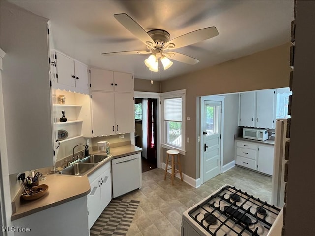 2508 Queenston Rd, Cleveland Heights, OH 44118 - kitchen with white appliances, a sink, ceiling fan, white cabinets, and open shelves