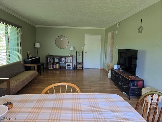 459 W Streetsboro St Unit F, Hudson, OH 44236 - living area featuring wood finished floors, a textured ceiling, and ornamental molding