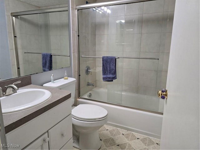 459 W Streetsboro St Unit F, Hudson, OH 44236 - bathroom with vanity, combined bath / shower with glass door, toilet, and tile patterned floors