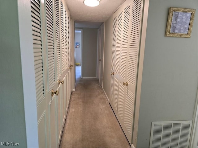 459 W Streetsboro St Unit F, Hudson, OH 44236 - hall featuring light carpet and baseboards