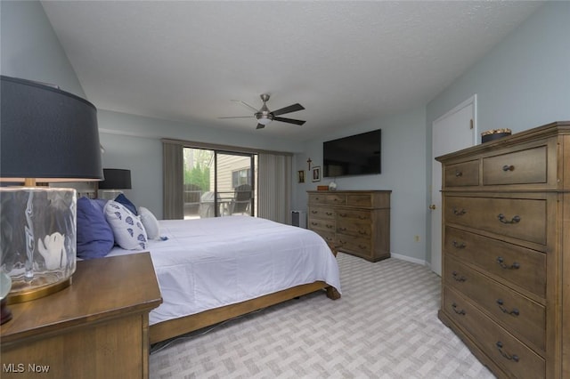 bedroom with light colored carpet, access to outside, ceiling fan, and baseboards